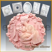 Mother Hugs Child to her Heart  - Detail of high relief sculpture - Food grade